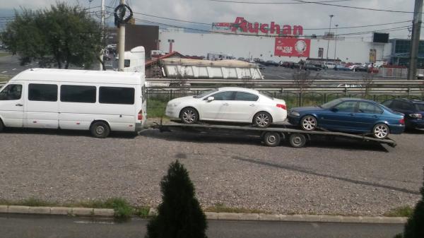 Transport auto pe platforma Romania Italia peugeot 508 si bmw 320i